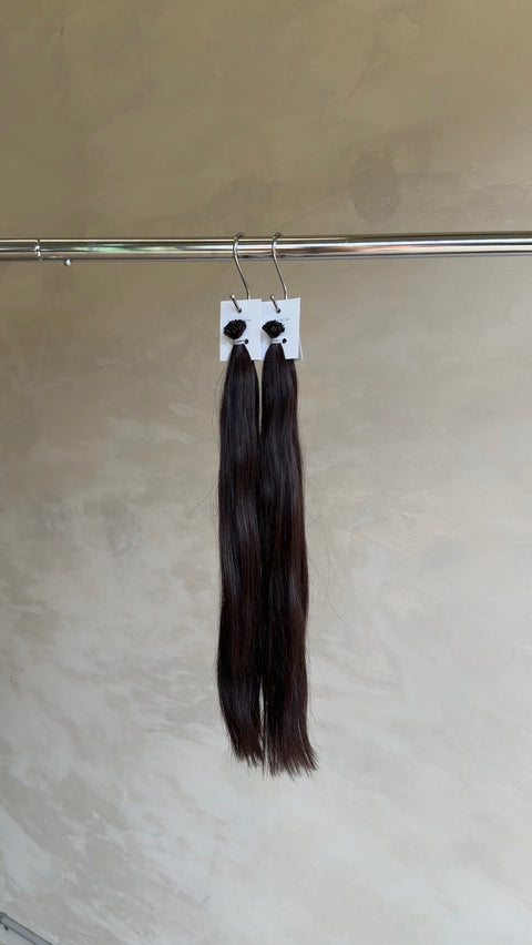 luxury hair extension salon in north brisbane specialising in seamless extensions, custom colour blending, keratin bonds and natural looking transformations 