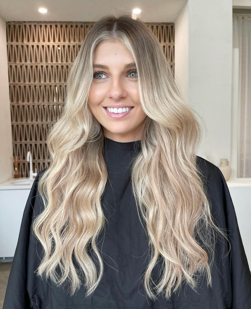 Custom weft hair extensions for added length and volume at James Collective Hair North Lakes