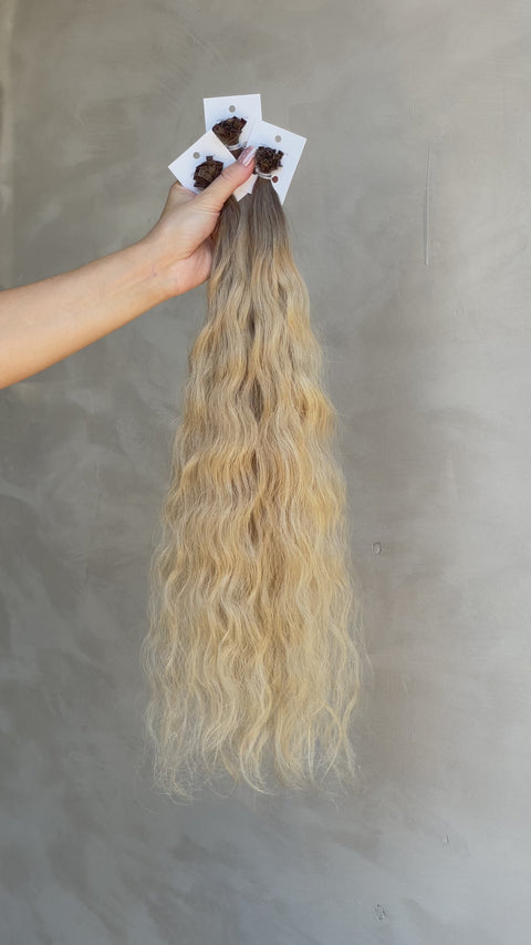 curly keratin bond extensions for natural seamless results.