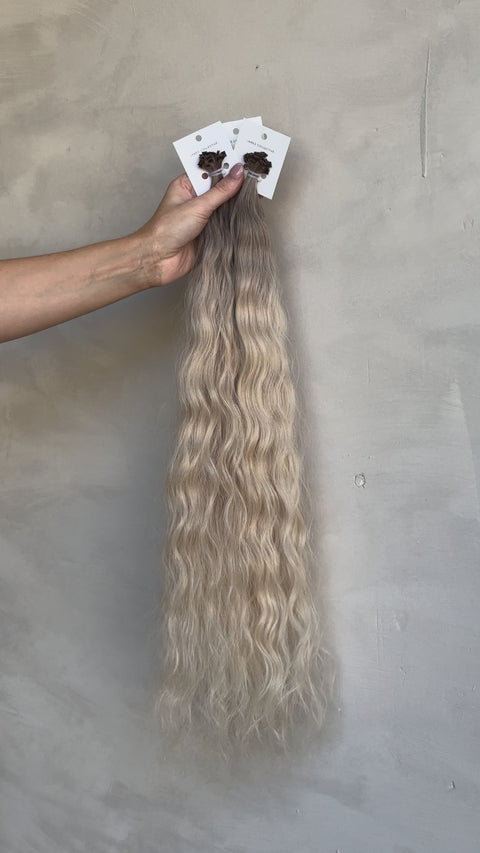 Natral wavy slavic hair extensions 